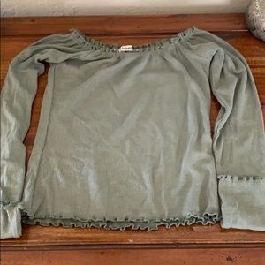 Green, tight long sleeve shirt
